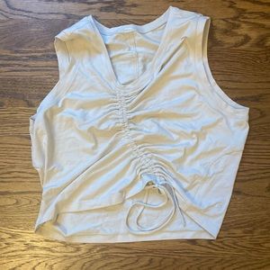 Off white lululemon slightly cropped tank top with string to tie